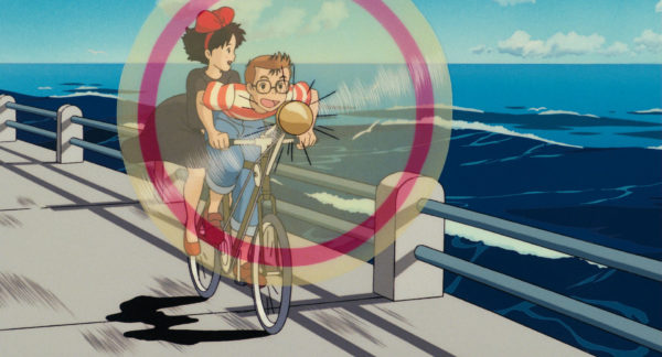 映画「魔女の宅急便」のワンシーンで、トンボが自転車でキキを乗せているシーン